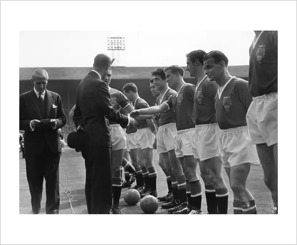 Manchester Uniteds Bobby Charlton shakes hands with Prince Philip before the 1958 FA Cup Final