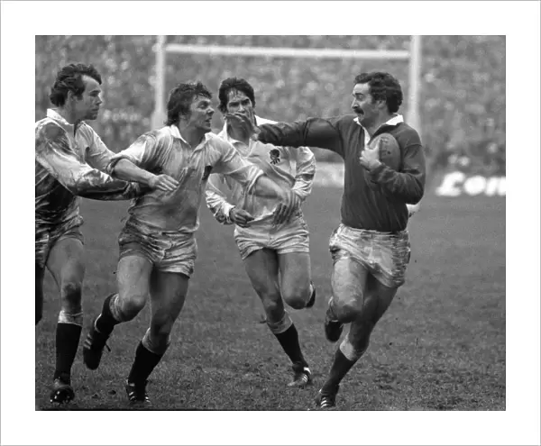Wales Leslie Keen fends off English defenders - 1980 Five Nations