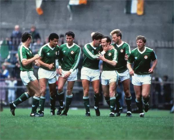 Liam Brady and his Ireland teammates celebrate his goal against Brazil in 1987