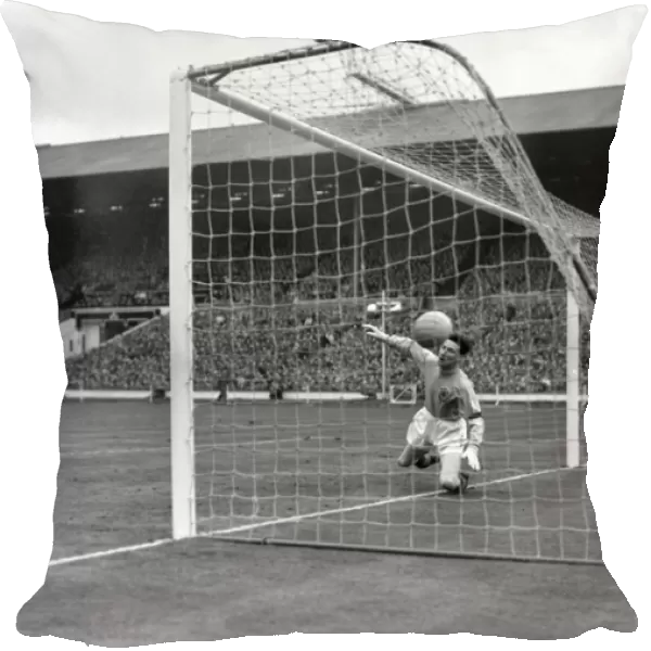 Bobby Charlton scores against Scotland at Wembley in 1959