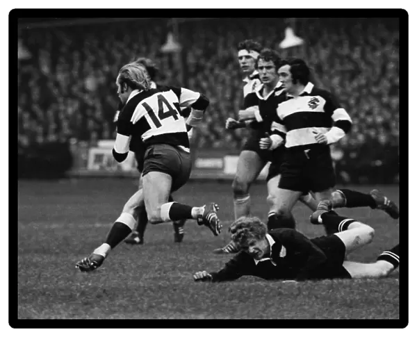 David Duckham makes a break for the Barbarians against the All Blacks in 1973