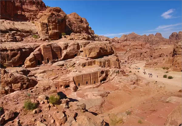 Tombs in sandstone rocks around the valley in the rock city of Petra, Jordan