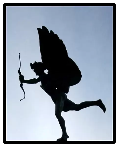 Silhouette of the statue of Eros, Piccadilly Circus, London, England