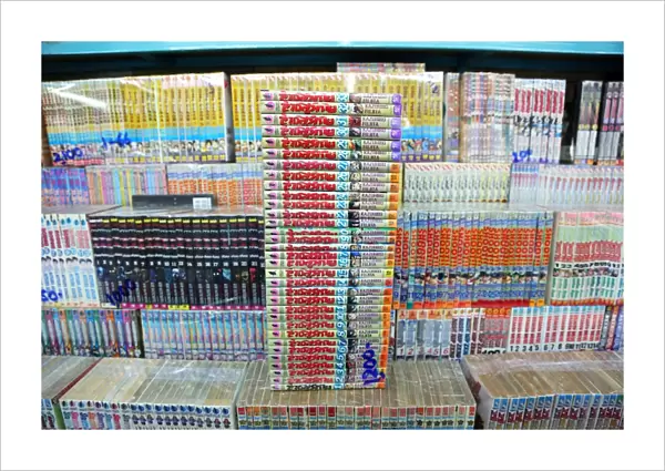 Pile of Thai books at a book stall at Chatuchak Weekend Market, the largest market in Thailand, Bangkok, Thailand