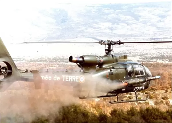 Aeropstiale Gazelle Helicopter firing rocket  /  missile