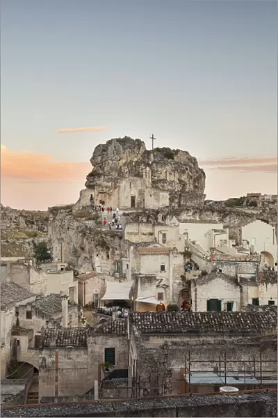 View of the ancient town and historical center called Sassi perched on rocks on top of hill
