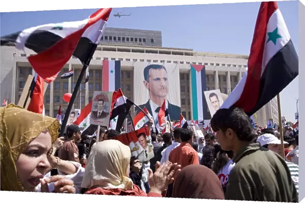 Supporters at a rally in downtown Damascus endorsing