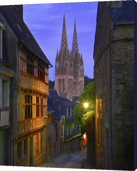 France, Brittany, Finistere, Quimper, view down cobbled street to Saint Corentin