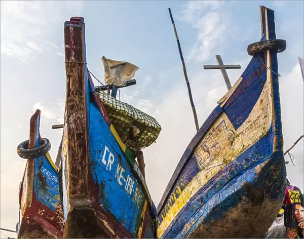 Africa, Ghana, Elmina and surroundings. Traditional fishing boats on the beach in Komenda