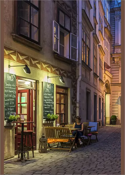 Night view of a street in the historic centre, Vienna, Austria