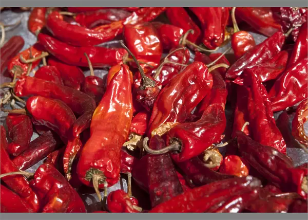 Ura, Bhutan. Red chilli peppers drying in the sun