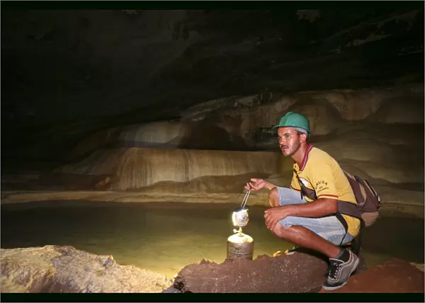 Brazil, Bahia, Chapada Diamantina, a guide in the Gruta da Lapa Doce caves in the