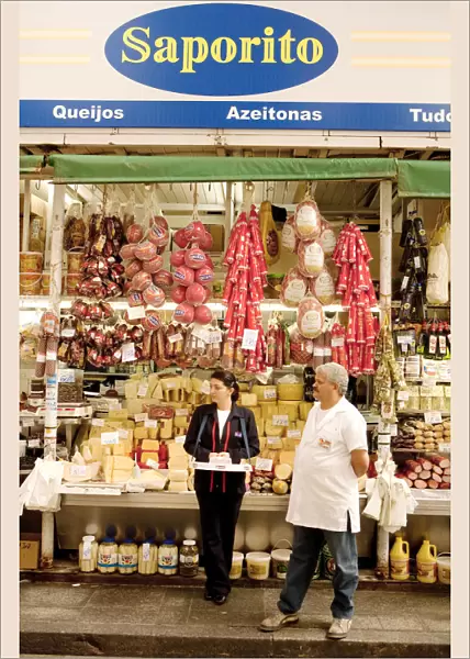 South America, Brazil, Sao Paulo, cheeses, olives and ham for sale at the Saporito