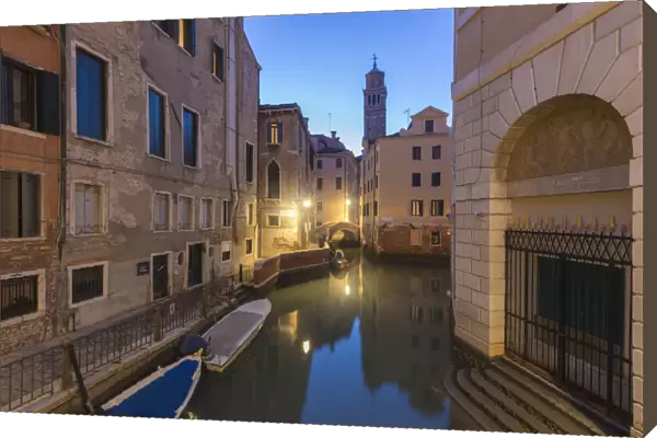 A venetian water canal at dusk, Venice, Veneto, Italy