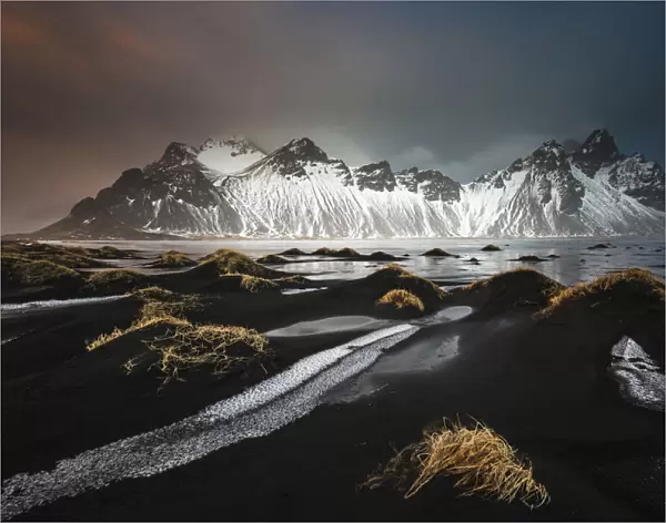 Vestrahorn mountain from Stokksness at sunrise, after a heavy storm in early winter