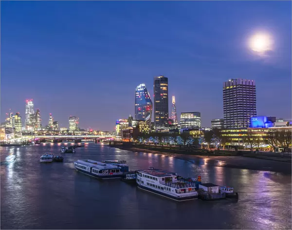 Full moon over St Pauls Cathedral, Blackfriars Bridge and financial district