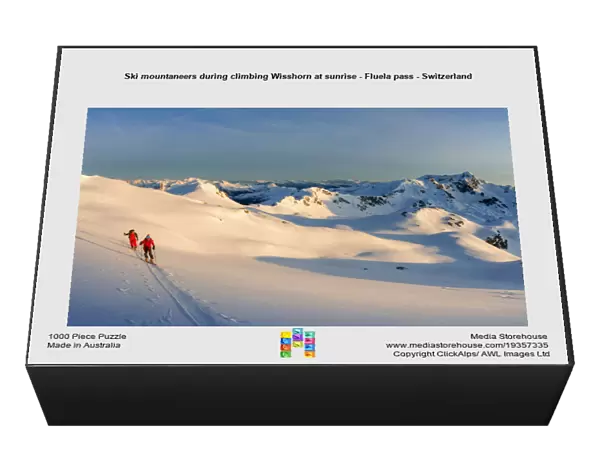 Ski mountaneers during climbing Wisshorn at sunrise - Fluela pass - Switzerland