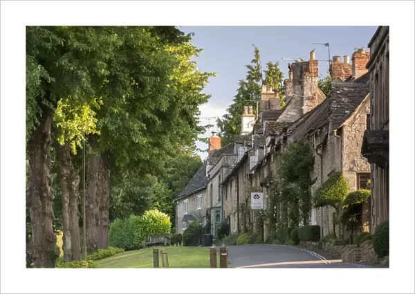 Pretty cottages along The Hill in the Cotswolds town of Burford, Oxfordshire, England