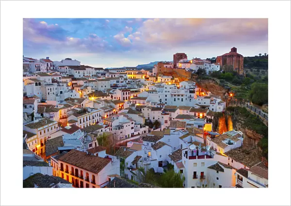 Spain, Andalucia, Setenil, view over village at dusk