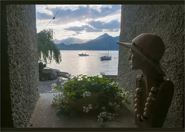 Varenna, Como lake, Lombardy, Italy. Dummy looking at lake