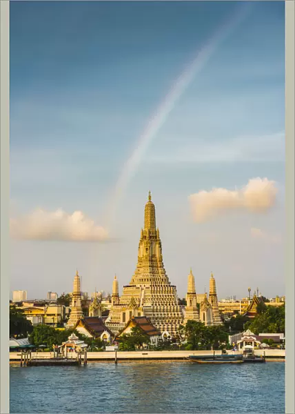 Rainbow over Wat Arun (Temple of Dawn) and Chao Praya River, Bangkok, Thailand