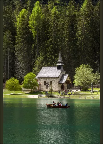 Lake Braies or Pragser Wildsee with Marienkapelle chapel, South Tyrol, Italy