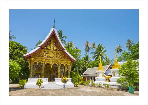 Wat Paphaimisaiyaram temple and stupas in front of monks quarters, Luang Prabang