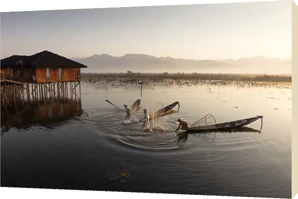 Intha fisherman beat water, Inle Lake, Shan State, Myanmar
