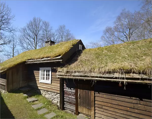 Traditional wooden houses with grass rooftops at Hordamuseet, an open-air museum at Fana