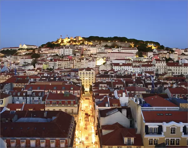 The historic centre (Baixa) and Sao Jorge castle at twilight. Lisbon, Portugal