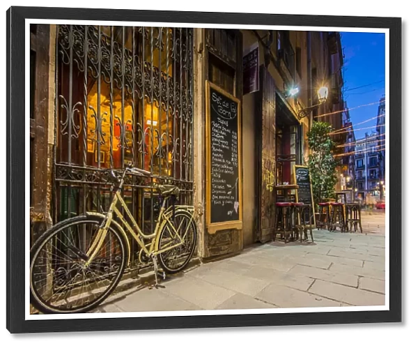 Picturesque night corner of Born neighborhood with tapas bar, Barcelona, Catalonia, Spain