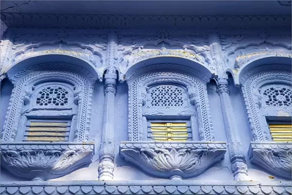 India, Rajasthan, Pushkar, Ornate windows on blue house