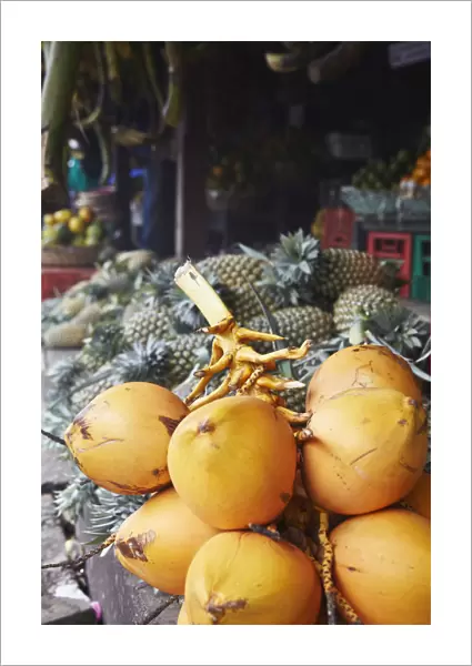 King coconuts at fruit stall in market, Galle, Sri Lanka