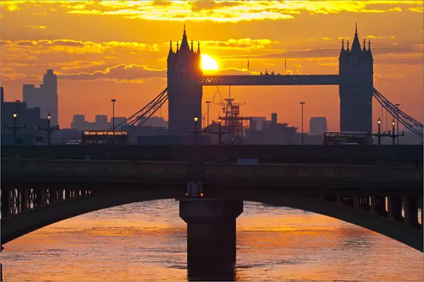 UK, England, London, Southwark Bridge and Tower Bridge at sunrise