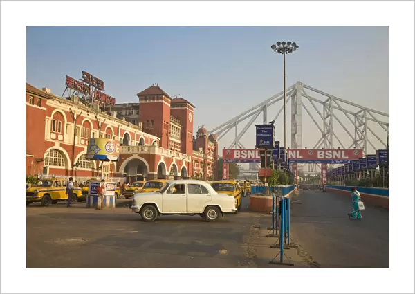 India, West Bengal, Kolkata, Calcutta, Yellow ambassador taxis outside Howrah train