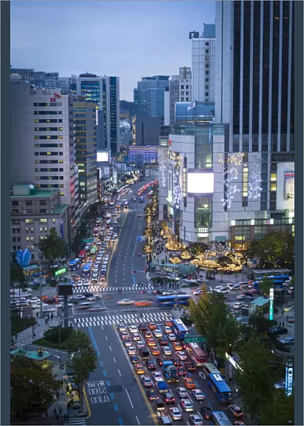Busy Namdaemun-ro at dusk in Myeong-dong, Myeongdong, Seoul, South Korea