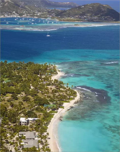 St Vincent and The Grenadines, View of Palm Island, with Union Island in distance