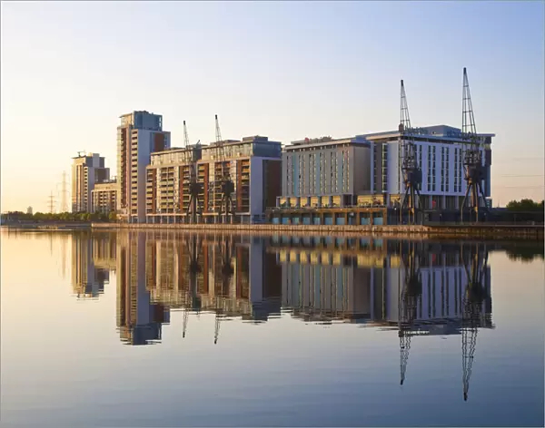 England, London, Hotels and appartment buildings reflecting in Royal Victoria Docks