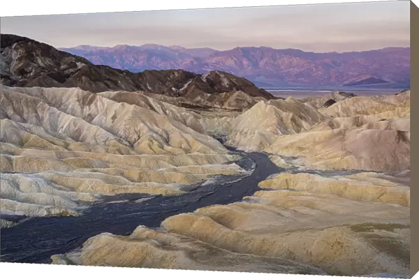 Natural rock formations at Zabriskie Point during sunrise, Death Valley National Park
