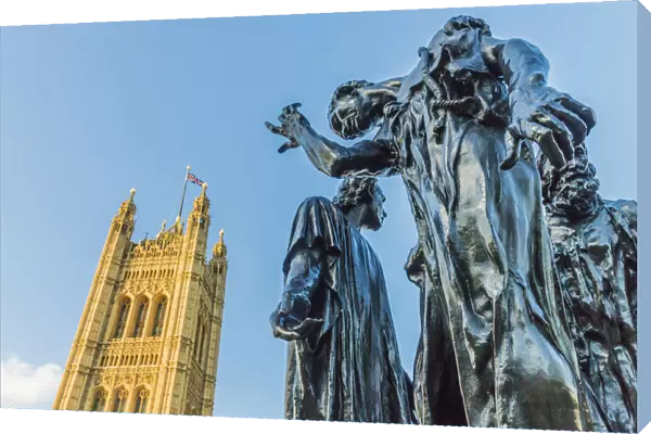 The Burghers of Calais statue by Auguste Rodin, and the Palace of Westminster a UNESCO