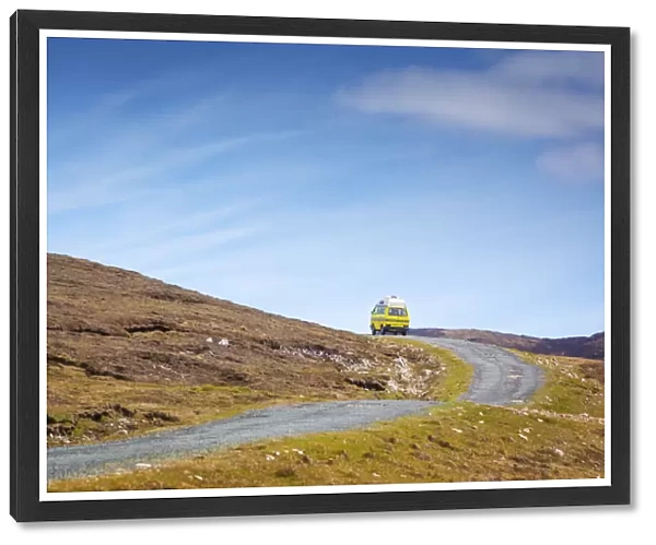 Ireland, Co. Donegal, Arranmore island, campervan on country road