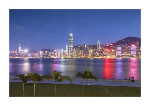 Skyline of Hong Kong Island at dusk from West Kowloon Art Park, Kowloon, Hong Kong