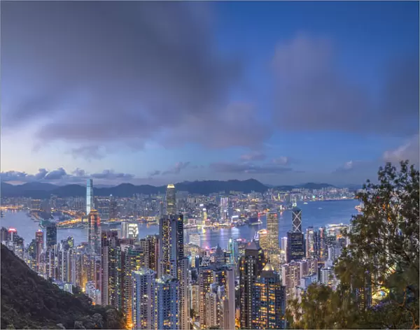 Peak Tower and skyline at dusk, Hong Kong