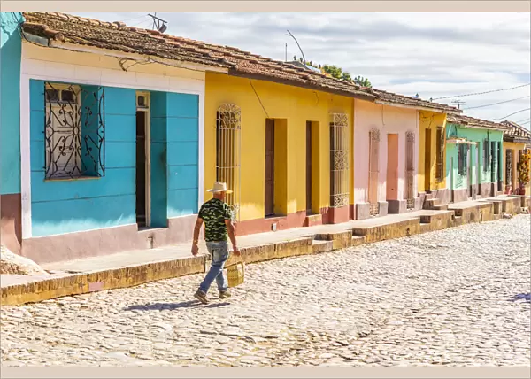 A man walking in a street in Trinidad, Sancti Spiritus, Cuba