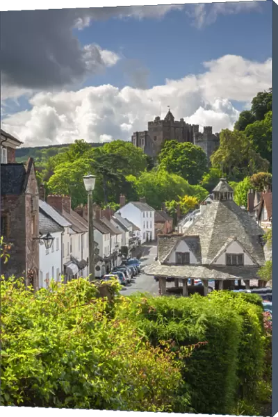 Dunster High Street, with the Yarn Market on the right and Dunster Castle beyond