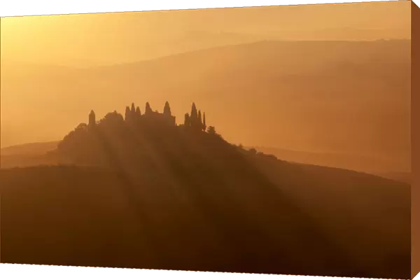 Podere Belvedere surrounded by haze during autumn at sunrise, Val d Orcia, Tuscany