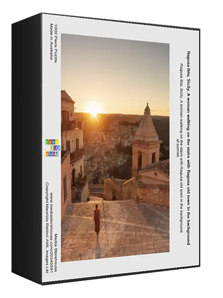 Ragusa Ibla, Sicily. A woman walking on the stairs with Ragusa old town in the background