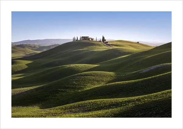 Lonely house into the hills in Asciano outskirt, Siena Province, Tuscany, Italy