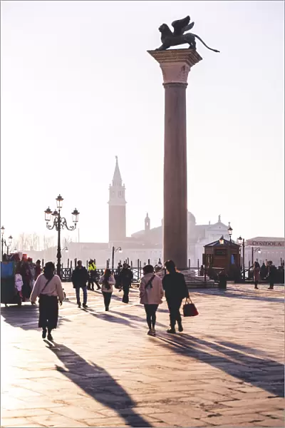 Paople crossing St. Mark square, Venice, Veneto, Italy