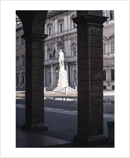 Piazza Roma, iconic square in Modena old town, with. Ciro Menotti statue Modena